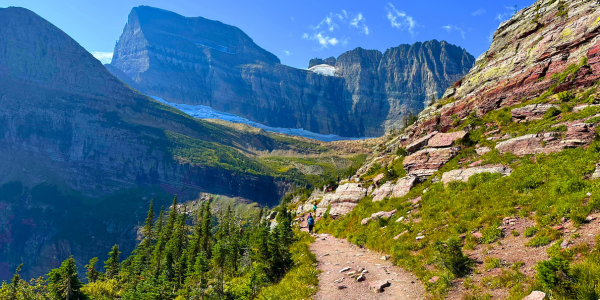 A photo of a hiking trail in the mountains of Montana on a bright sunny day