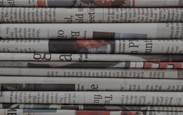 A photo of a stack of newspapers